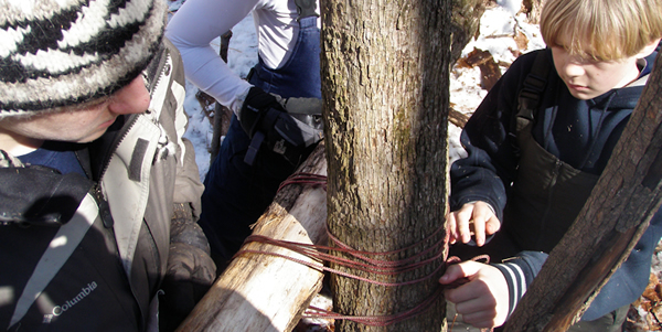Learning lashings to build a snow shelter on the Freeze-Out.